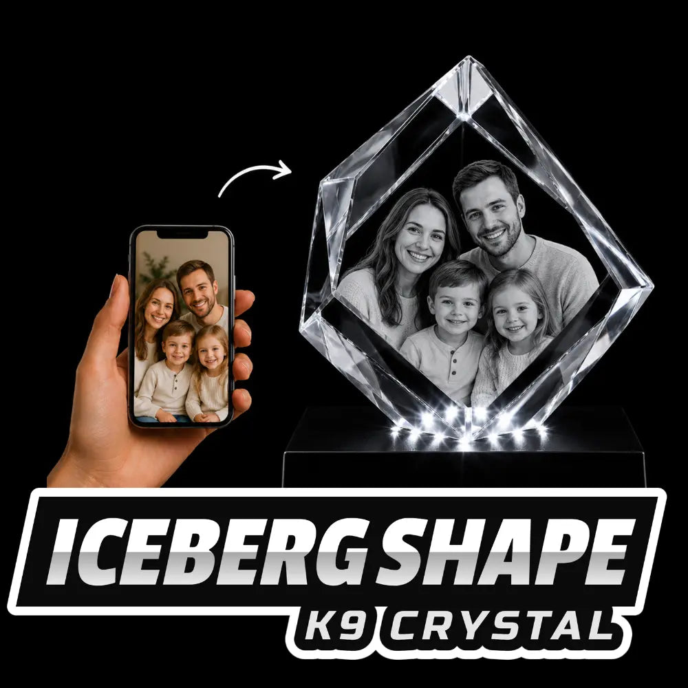 Personalized iceberg-shaped K9 crystal featuring a 3D laser-etched family portrait, illuminated from below by a bright LED base.